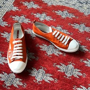 Prada | patent leather sneaker in orange | size EU 36 / US 7